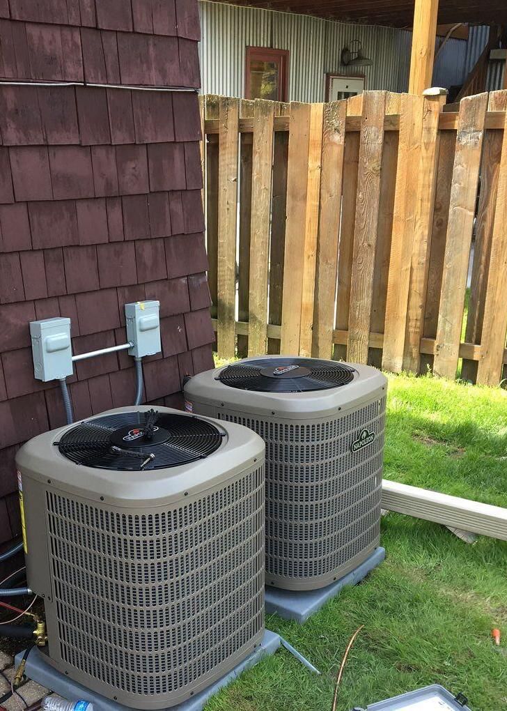 Two AC units installed by HVAC company Northfield Heating & Air in Northbrook, IL